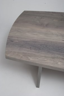 arc sided dining table